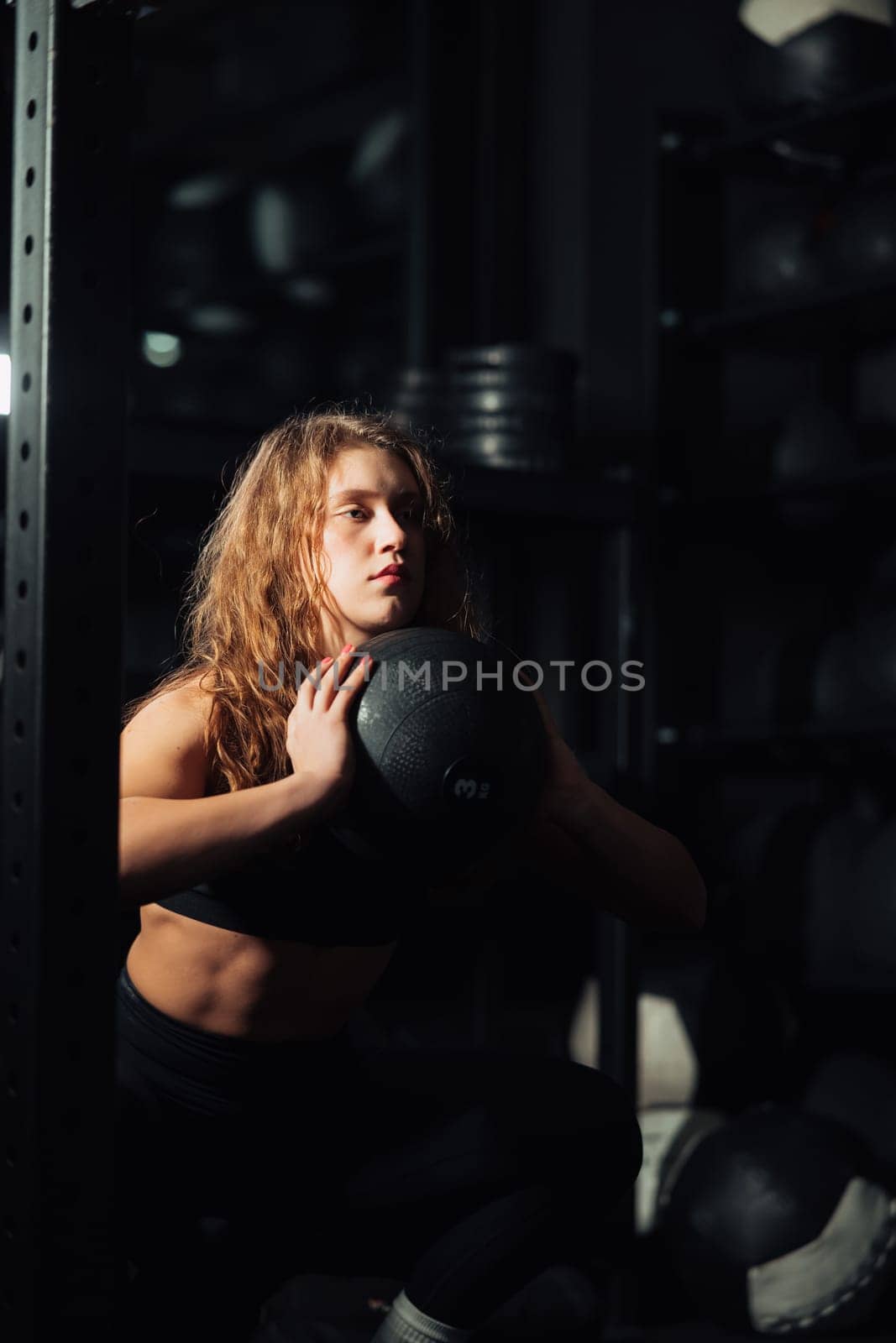 Athletic Beautiful Woman Does Her Cross Fitness, Bodybuilding Gym Training Routine