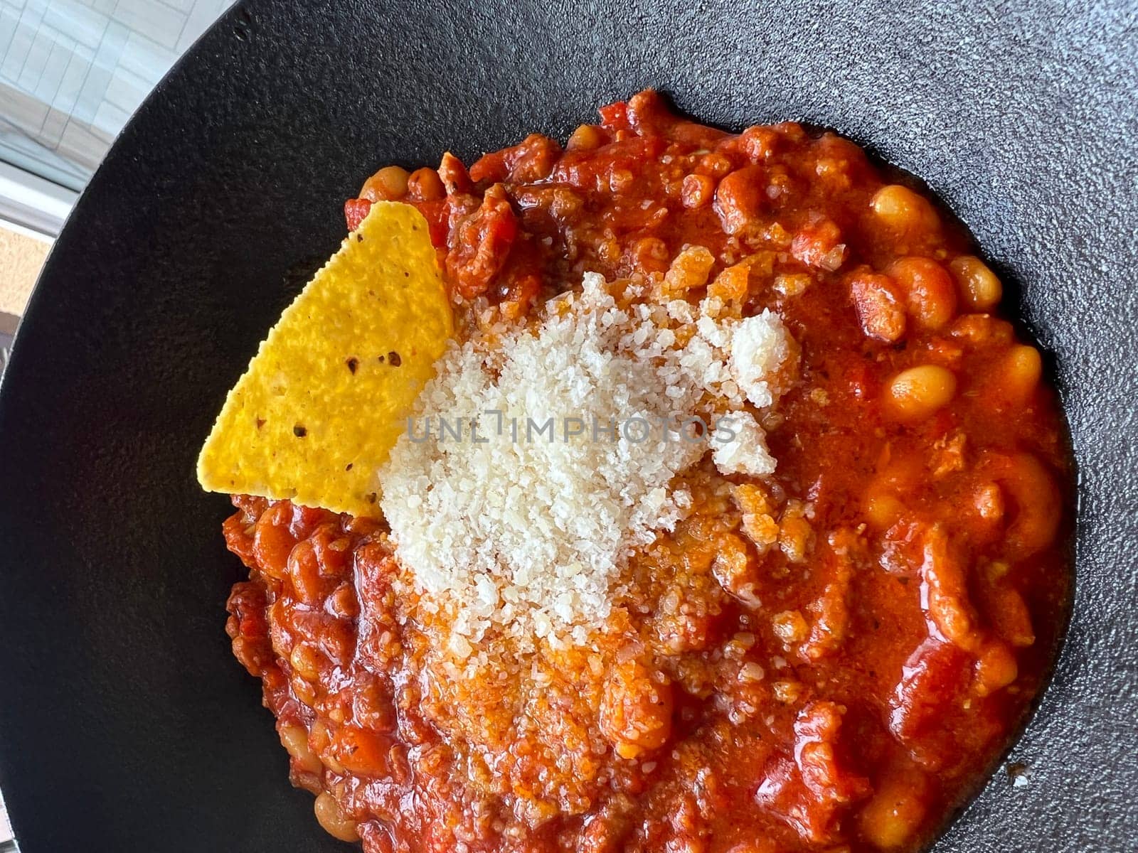 homemade meat chilli soup, cheese and corn. High quality photo