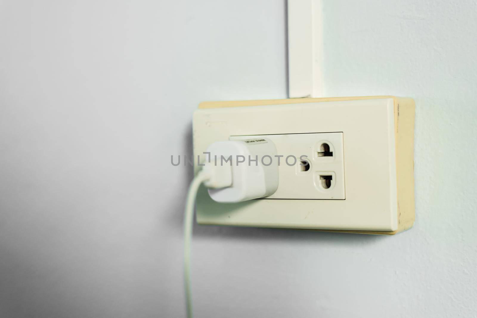 Plug power socket on the wall