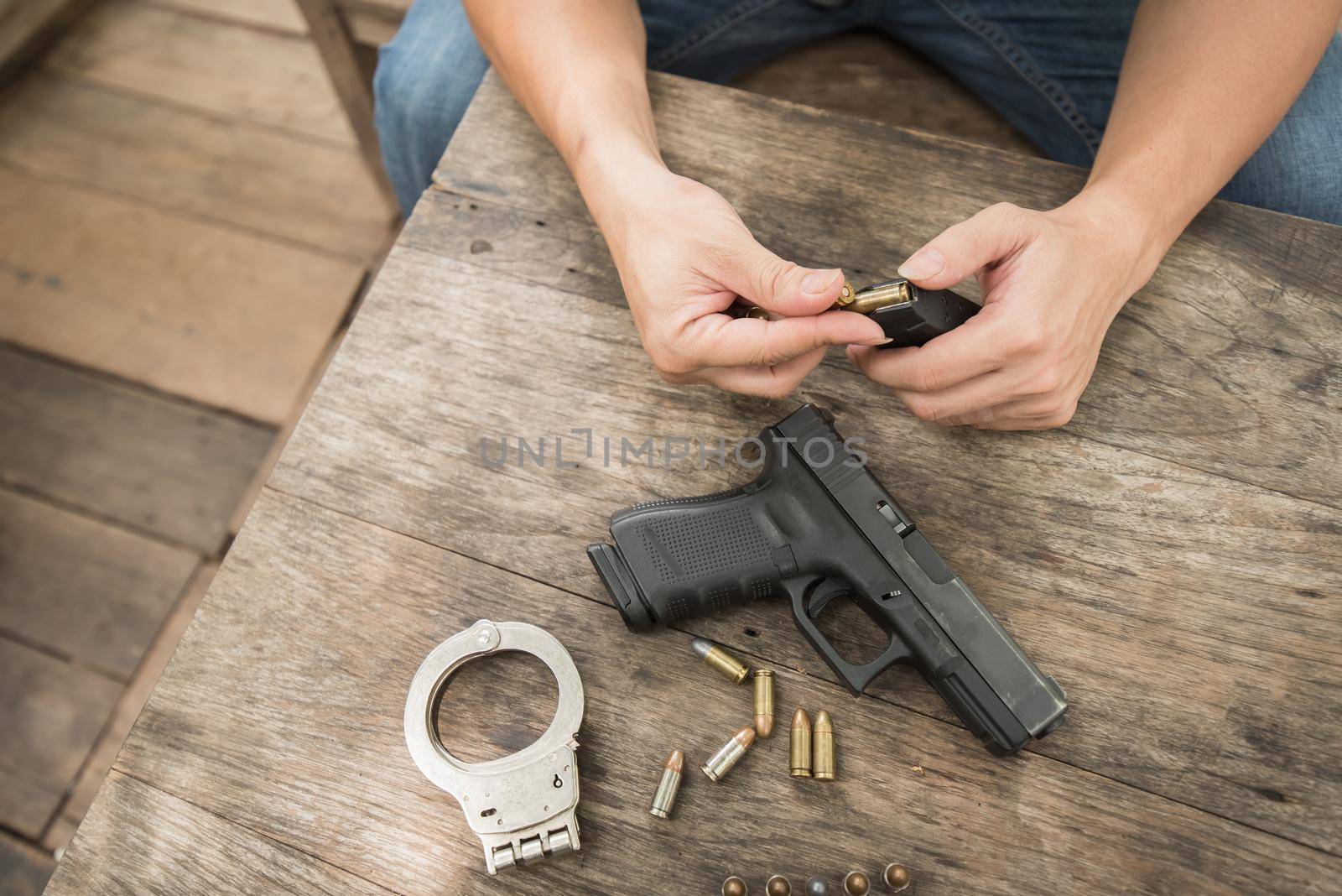 man input bullets gun by Wmpix