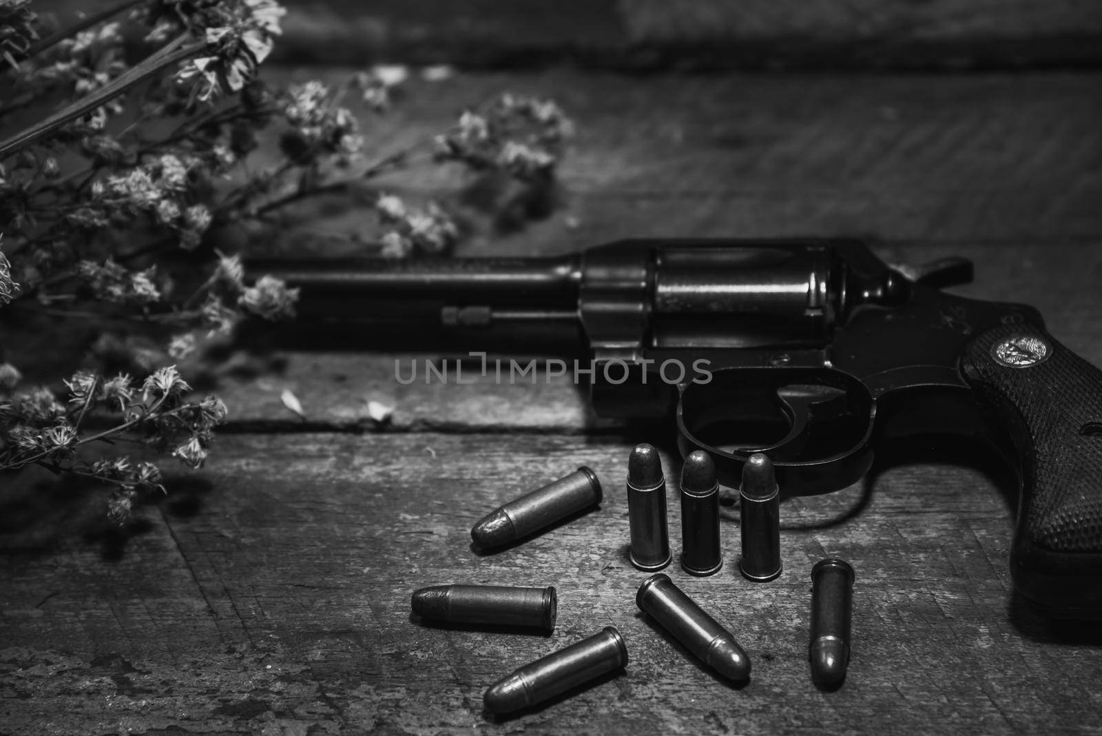 handgun bullets on wood table