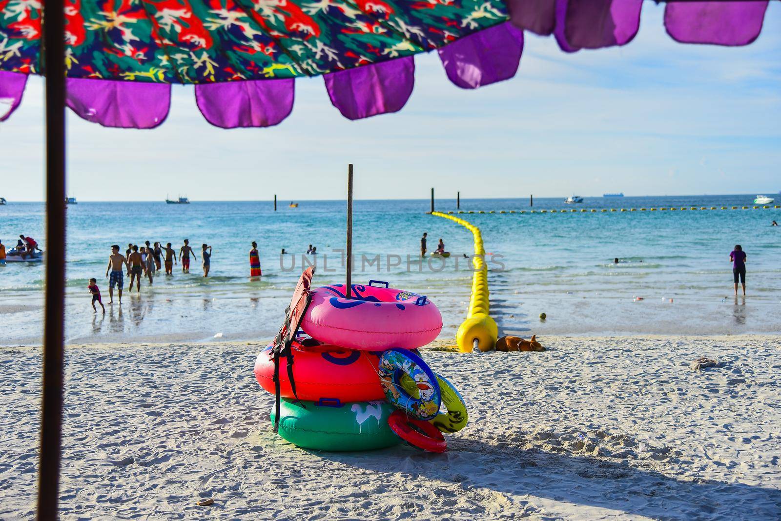 Lifebuoy On Sandy Beach