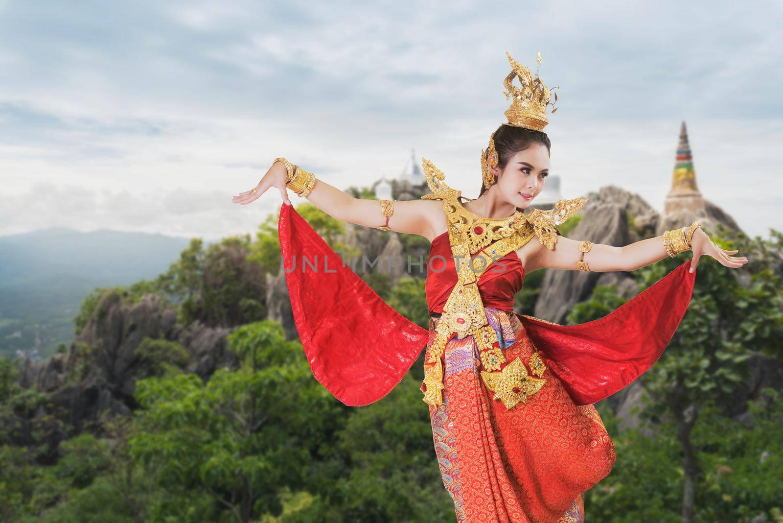 woman wearing typical thai dress with thai style by Wmpix
