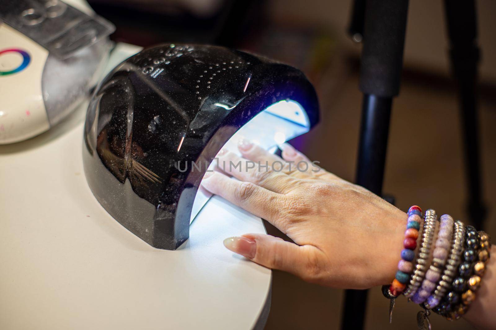 nail decorations with special uv gel using various color gel led lamp
