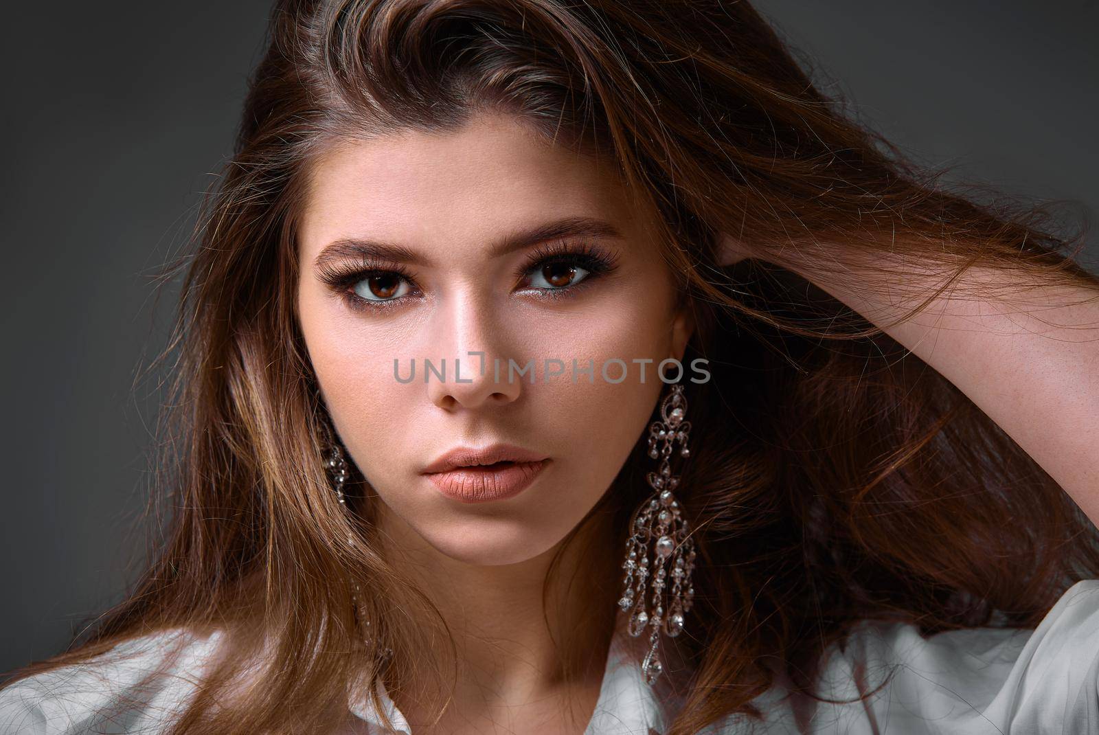 Portrait of beautiful girl in Studio on dark background