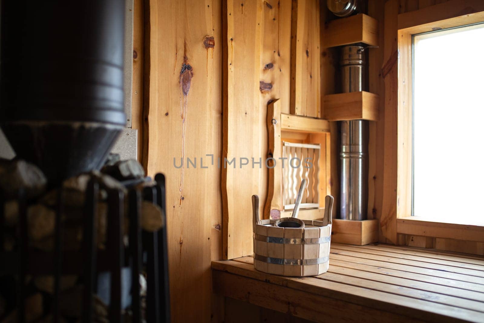 wooden tub in the bath on the shelf.