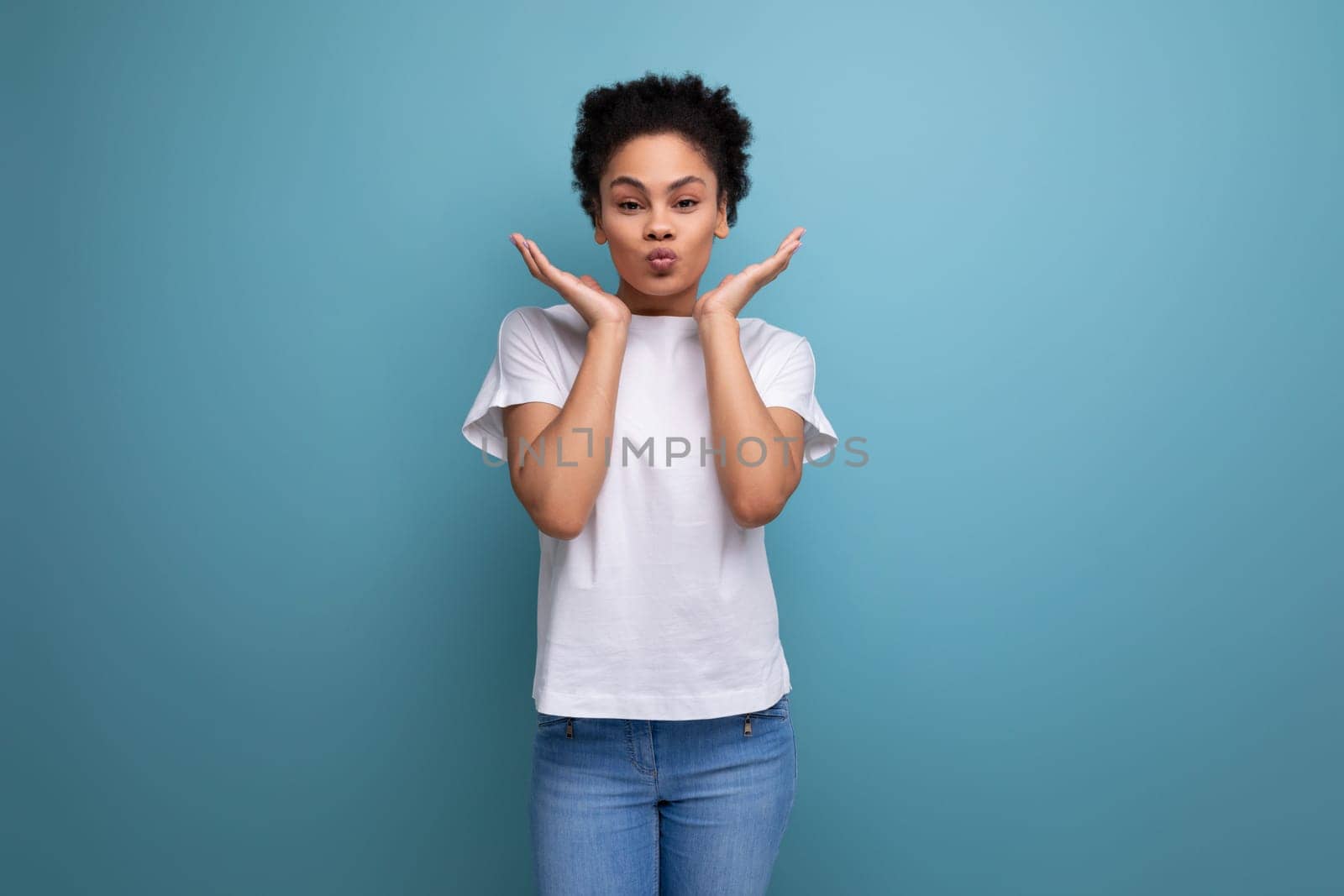 young latin woman dressed in white t-shirt with print mockup.