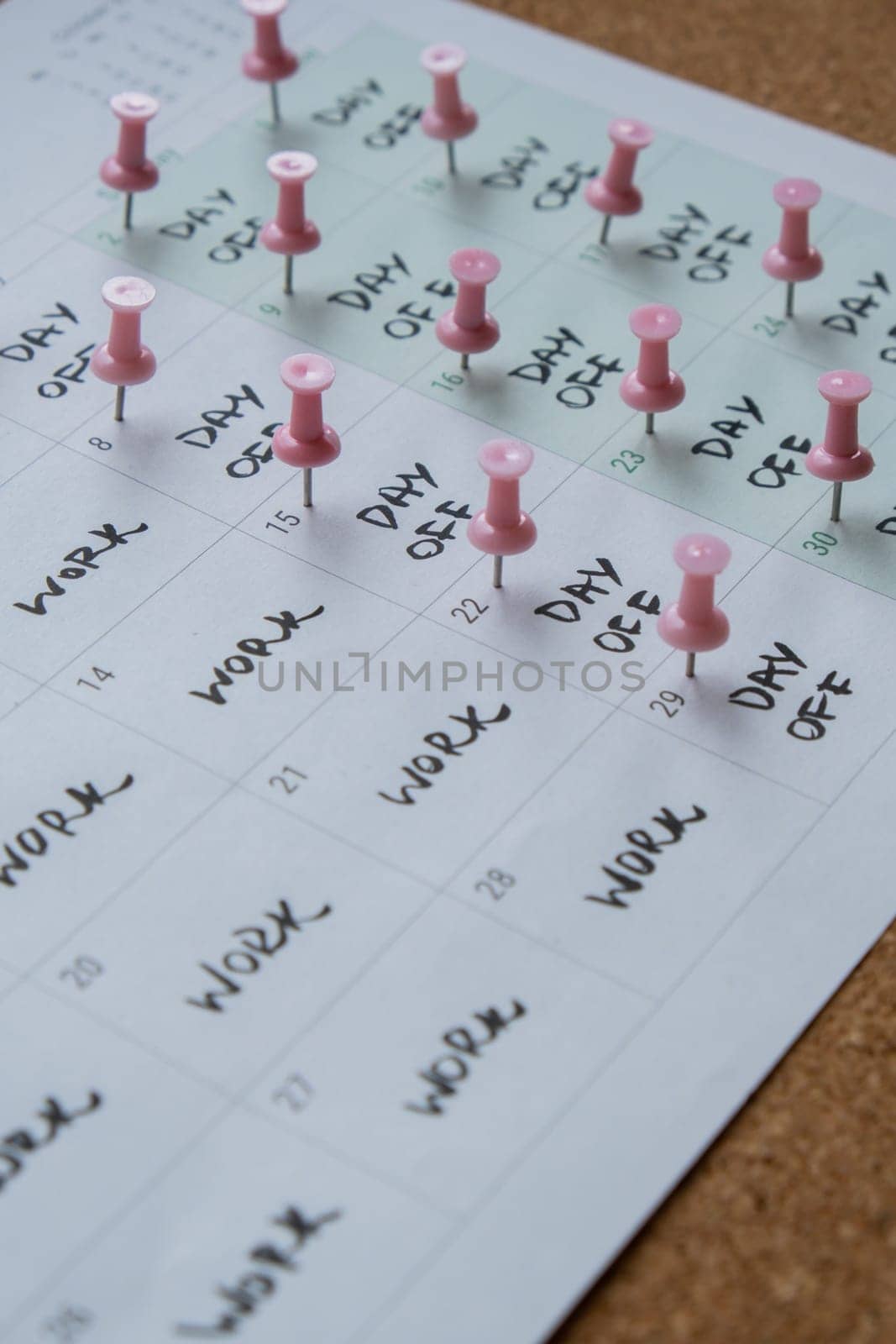 4 day work week printed calendar with pink pins on three days off in week weekend days four day working week concept. Modern approach doing business short workweek. Effectiveness of employees. Productivity and efficiency days off