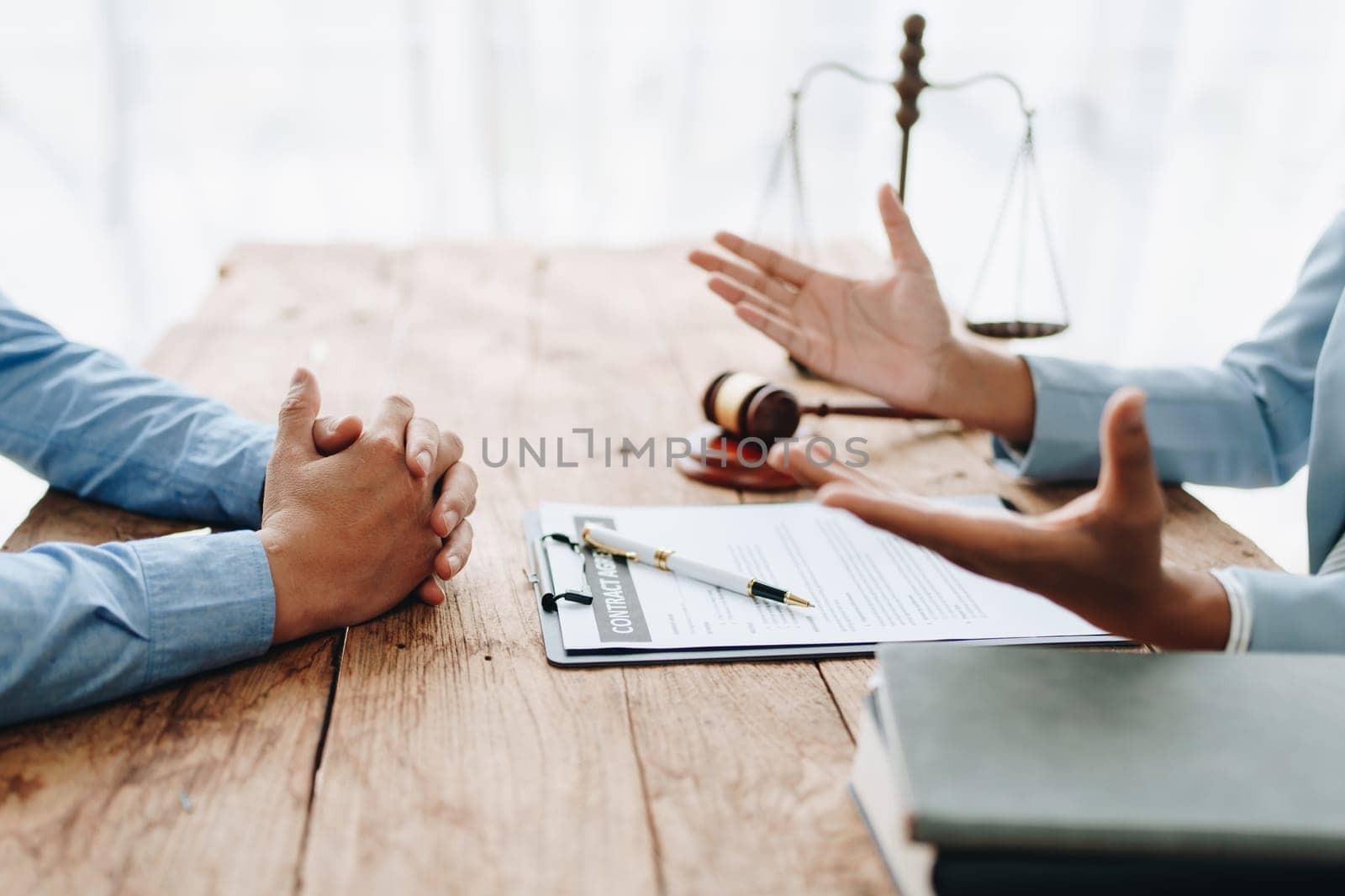 Portrait of african american woman lawyer studying lawsuit a for a discussing client documents law data before going to court