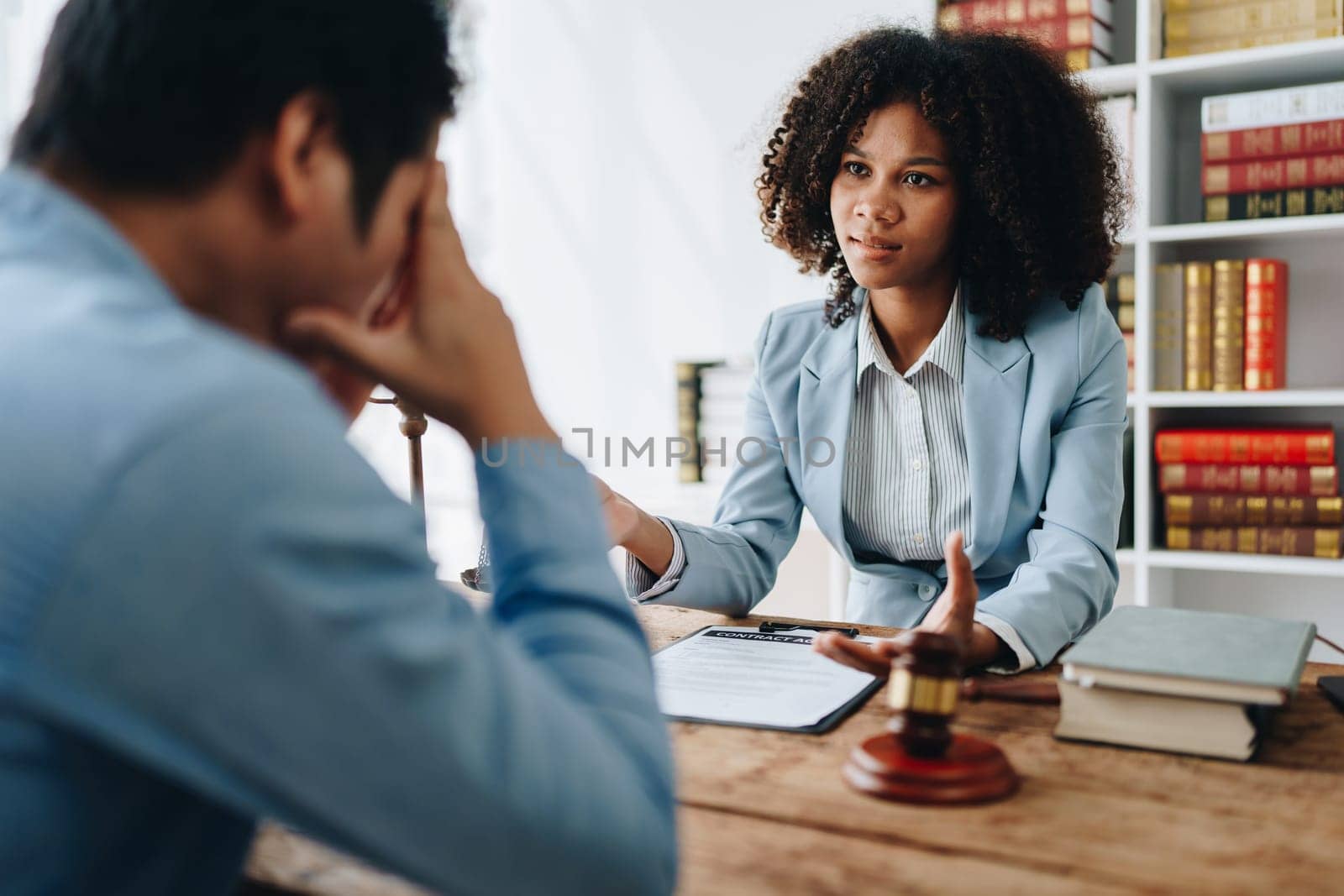 african american attorney, lawyers discussing contract or business agreement at law firm office, Business people making deal document legal, justice advice service concepts.