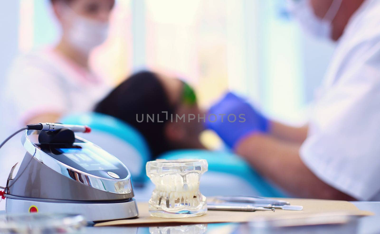 Dental equipment tools dentist medicine on desk.