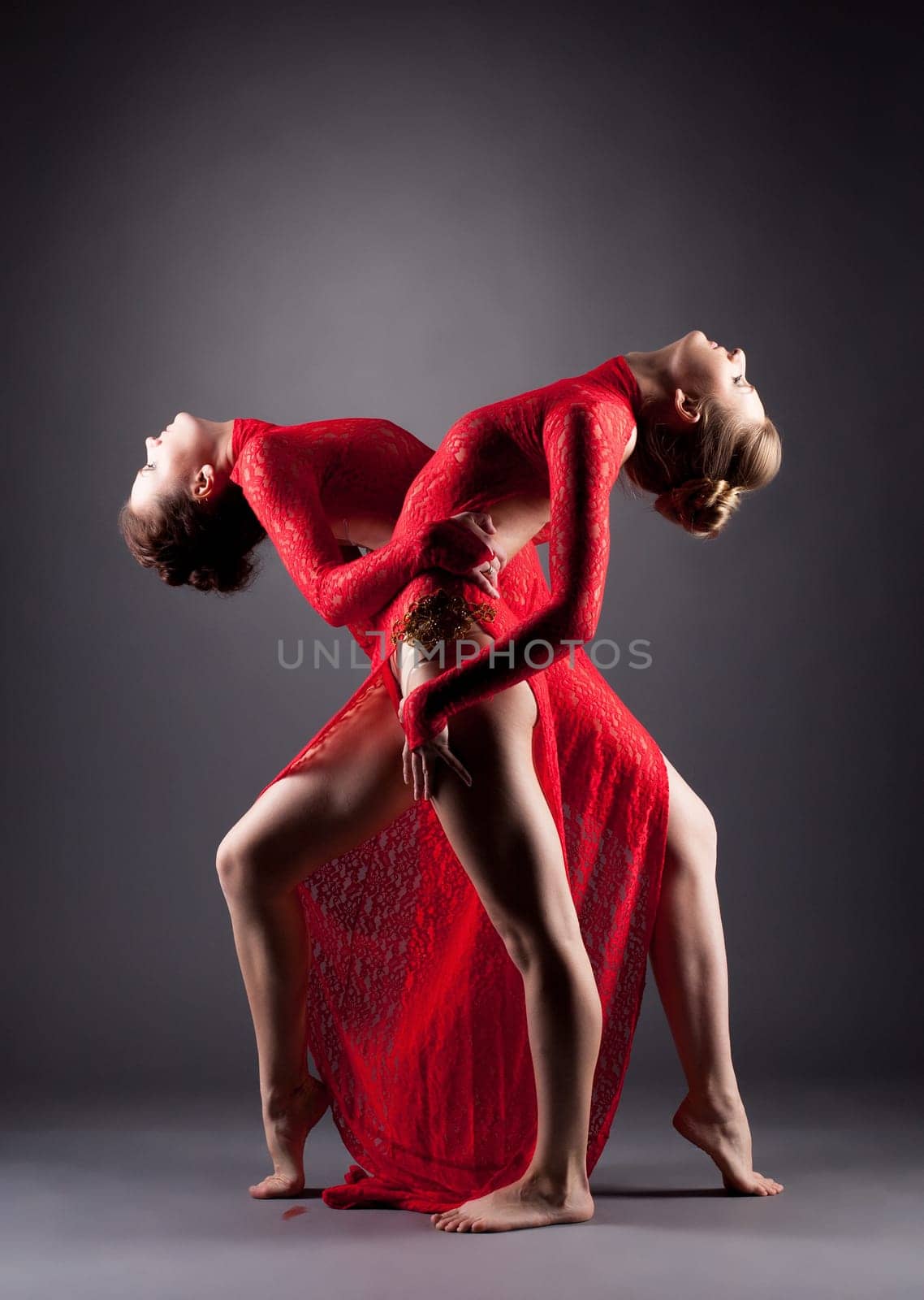 Studio shot of sexy dancers posing at camera by rivertime