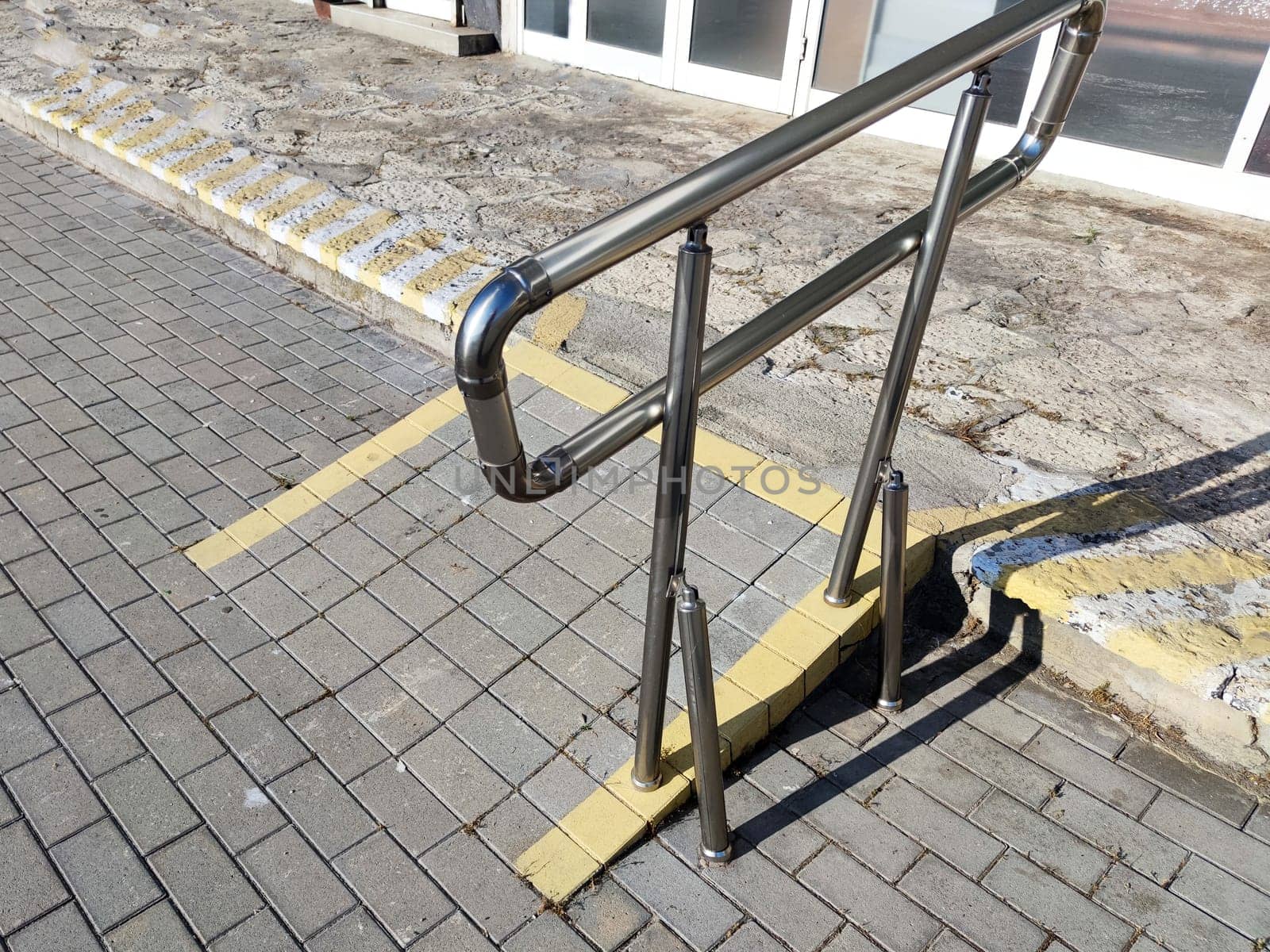 low ramp with handrails for people with disabilities by Annado