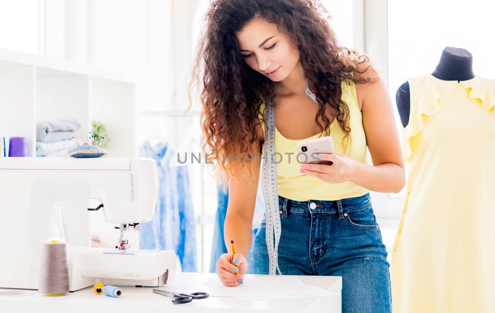 Seamstress talking on phone by GekaSkr