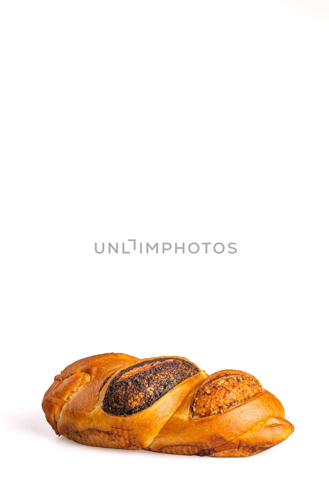 delicious fresh loaf with poppy seeds on a white background by Pukhovskiy