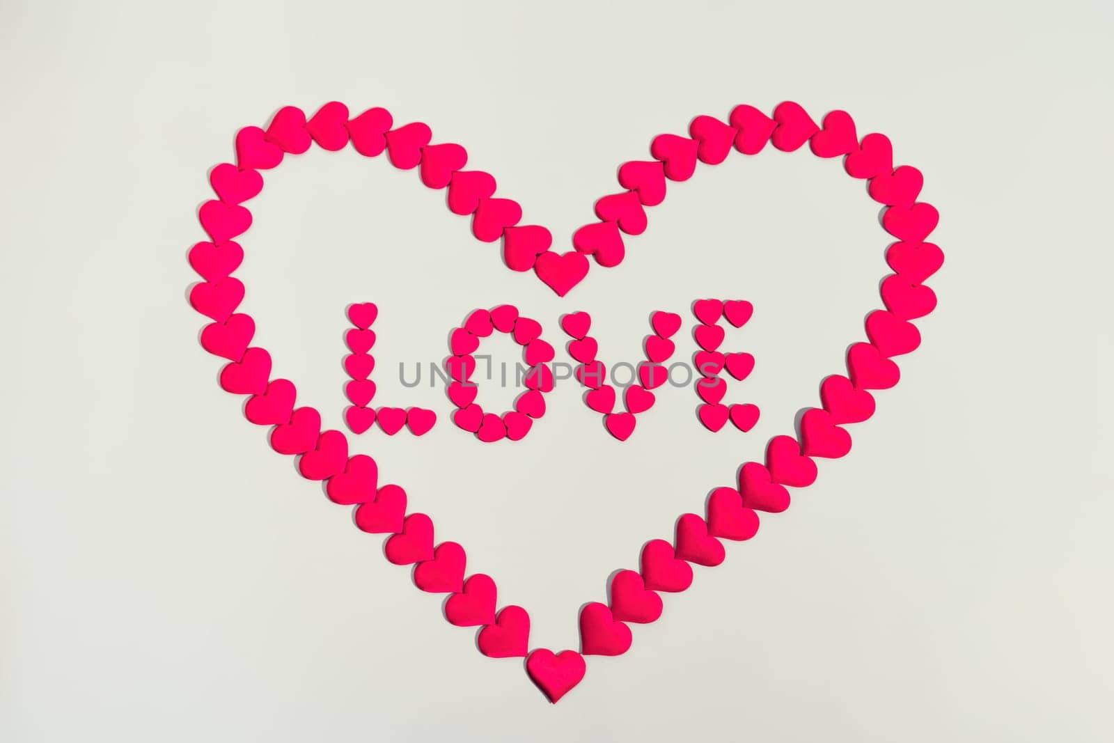 Heart love. Red heart shape from small hearts with the inscription I love you. Valentine's day lovers