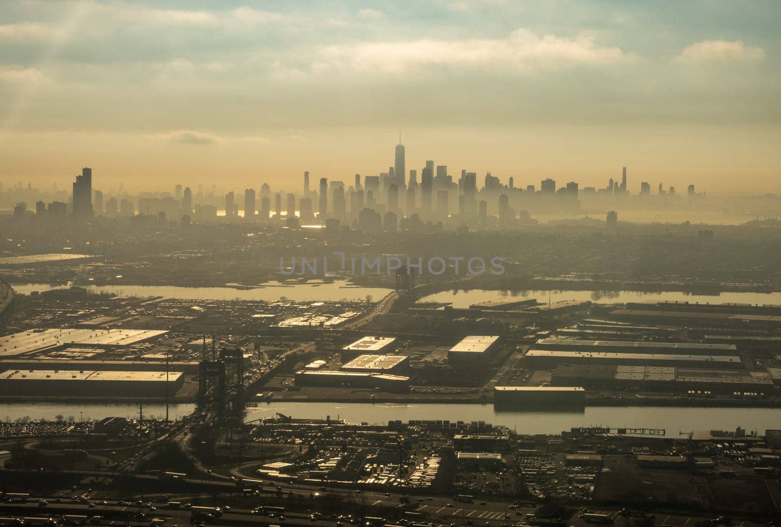 Foggy early morning panorama of New York and New Jersey from plane landing at Newark airport