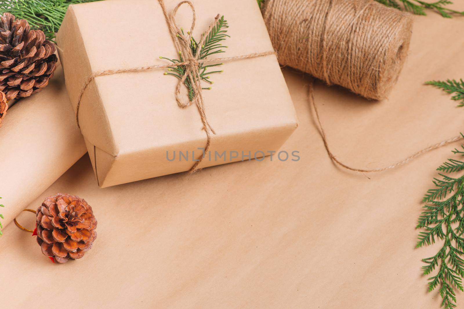 Christmas or New year gift boxes collection wrapped in kraft paper on wood background. by makidotvn