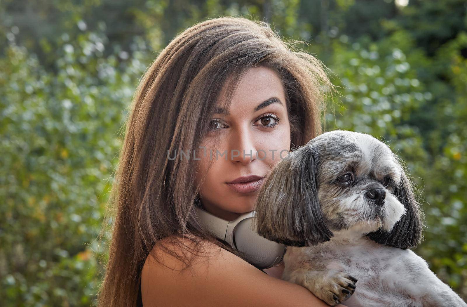 Oung woman with her cute Shih Tzu. by AliaksandrFilimonau