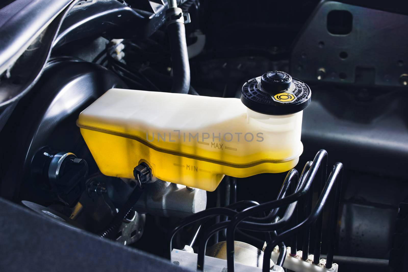 Brake fluid reservoir and brake booster of the car