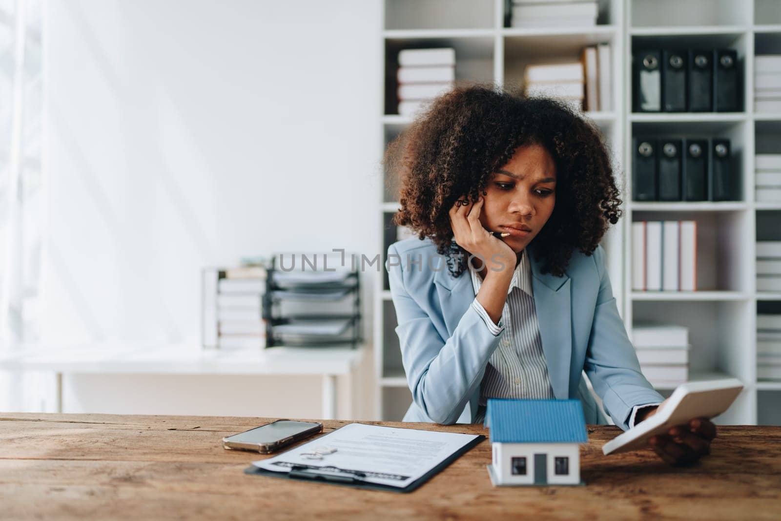 young women asia sad lady people sit sofa couch at home think hard worry in tax expense saving issue past due loan late payment on covid impact life feel grief pensive housing debt concepts