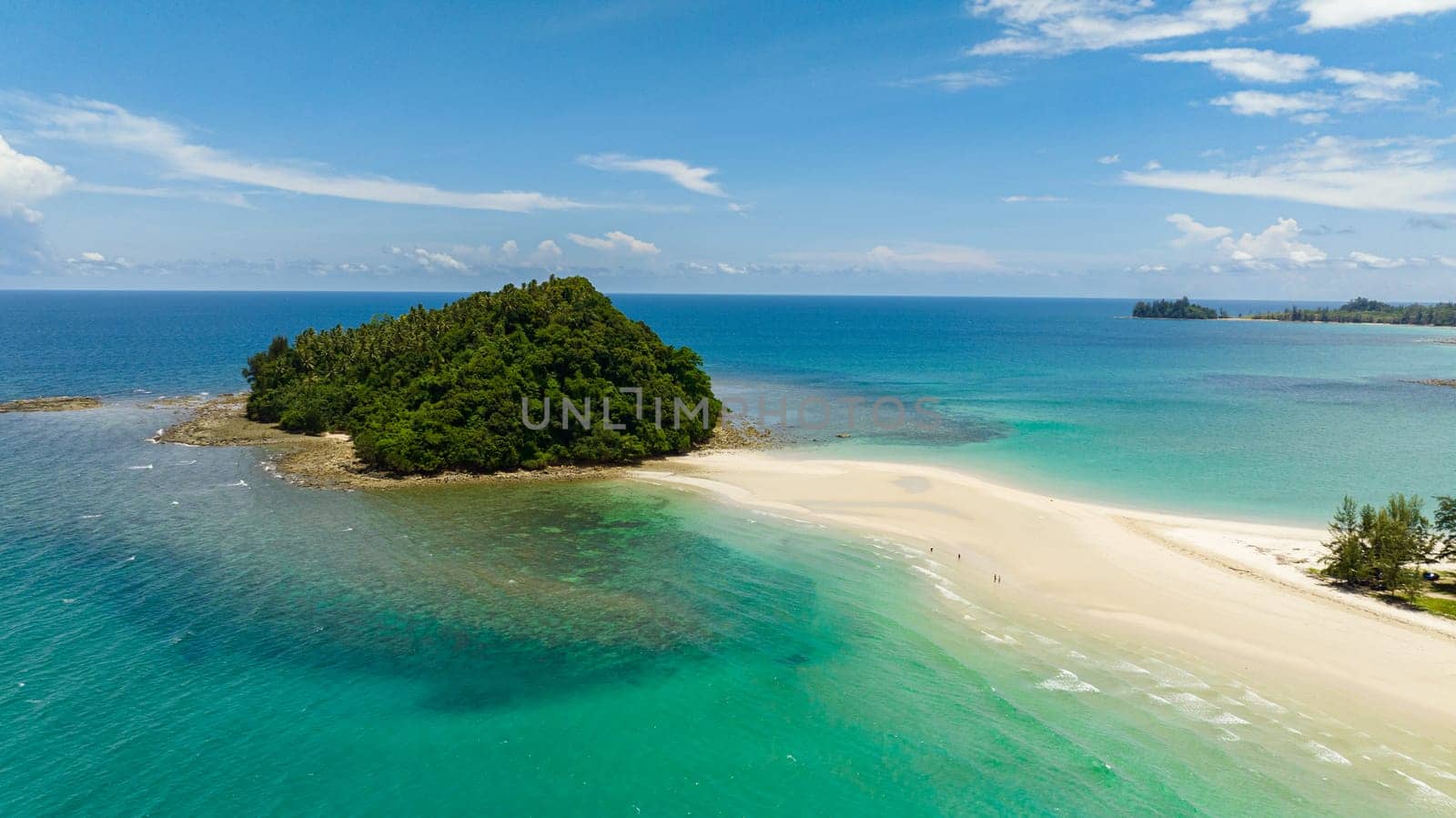 Aerial drone of beautiful sandy beach and tropical island. Tropical landscape. Kelambu Beach. Borneo, Malaysia.