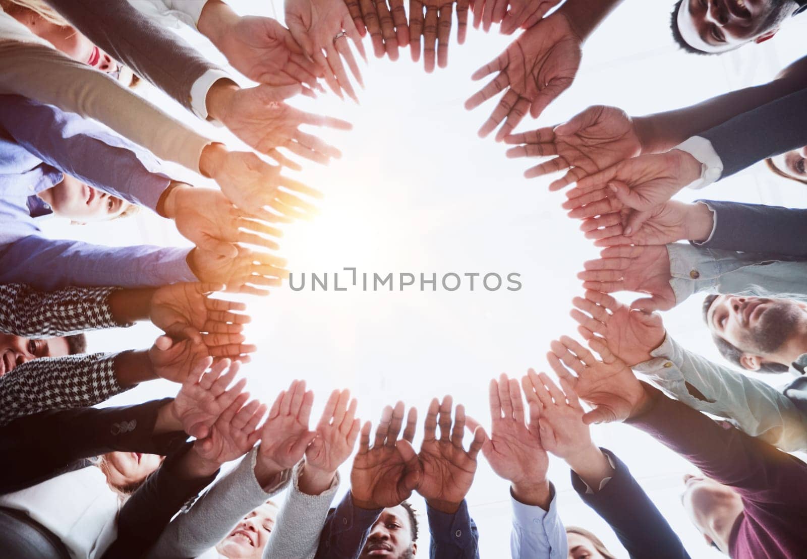 People holding hands together, view from below. Group therapy