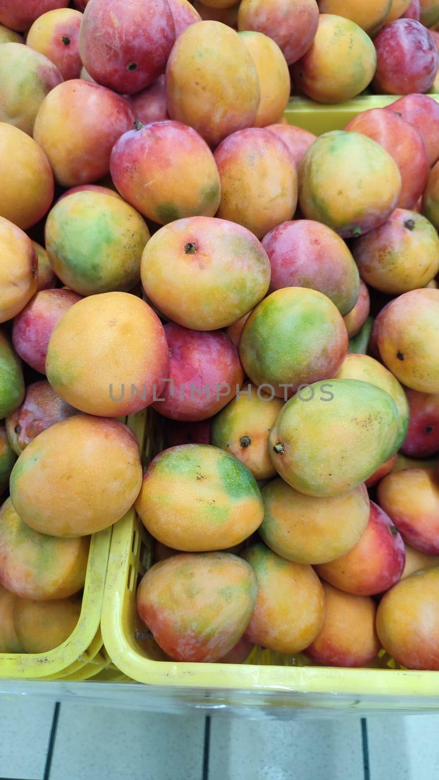 fruit mango frash food, yellow-red products in the store. High quality photo
