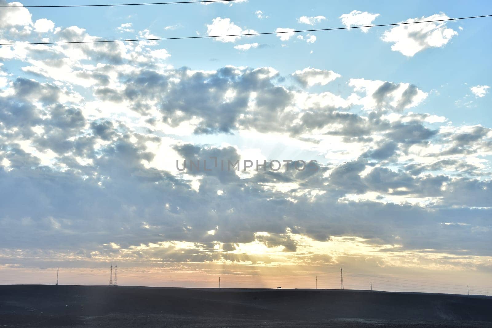 Clouds in the sunset evening sky, natural background. High quality photo