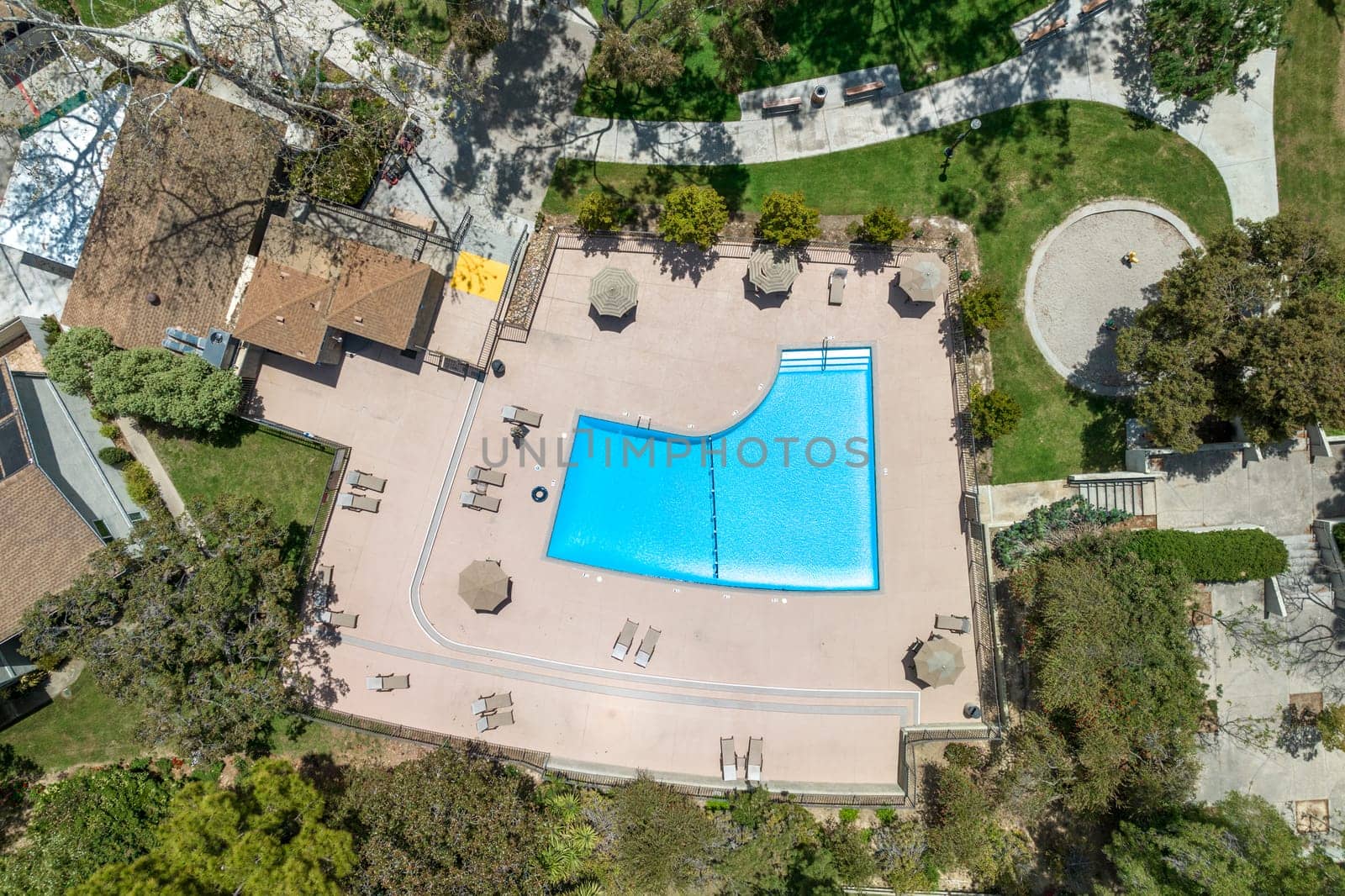 Aerial view of recreational facilities with pool in private residential community in La Jolla by Bonandbon