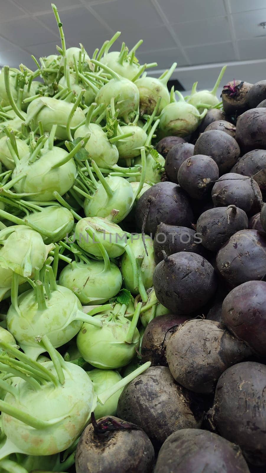 fresh green cabbage kohlrabi and beets, vegetables in the store, food background. High quality photo