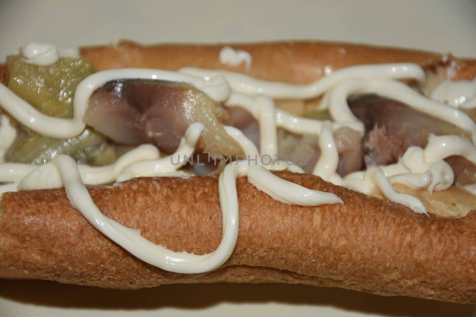 white bun with fish and mayonnaise. High quality photo