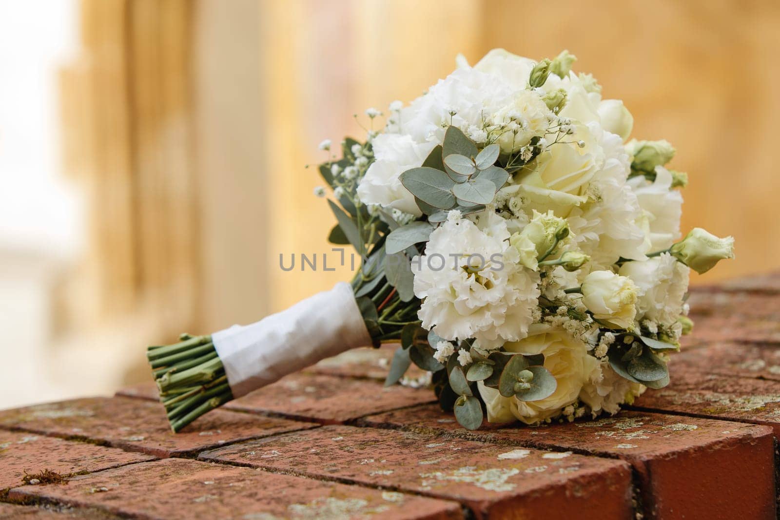 Bride's bouquet of fresh flowers. Close-up. Soft focus. by leonik