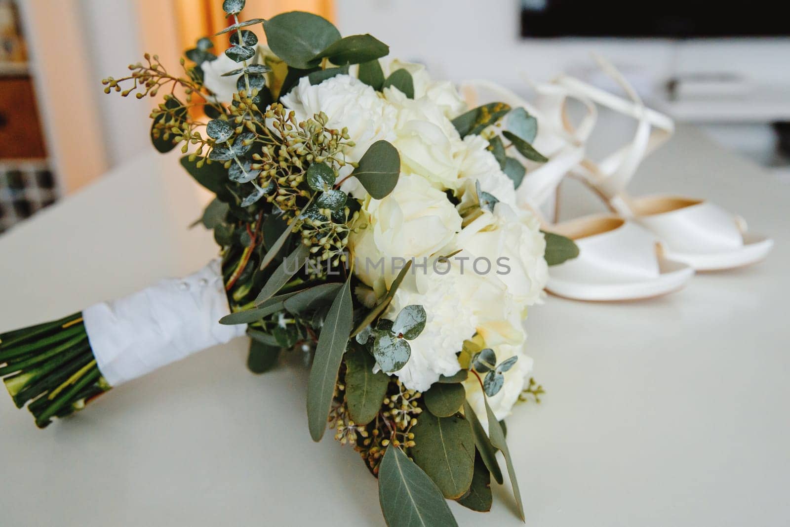 Bride's bouquet of fresh flowers. Close-up. Soft focus.