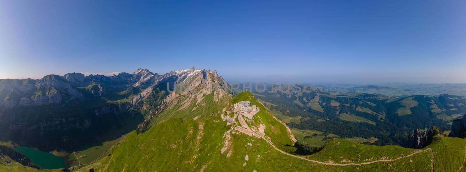 Schaefler Altenalptuerme mountain ridge swiss Alpstein alpine Appenzell Innerrhoden Switzerland,steep ridge of the majestic Schaefler peak in the Alpstein mountain range Appenzell, Switzerland with the fog covering the Seealpsee valley by fokkebok