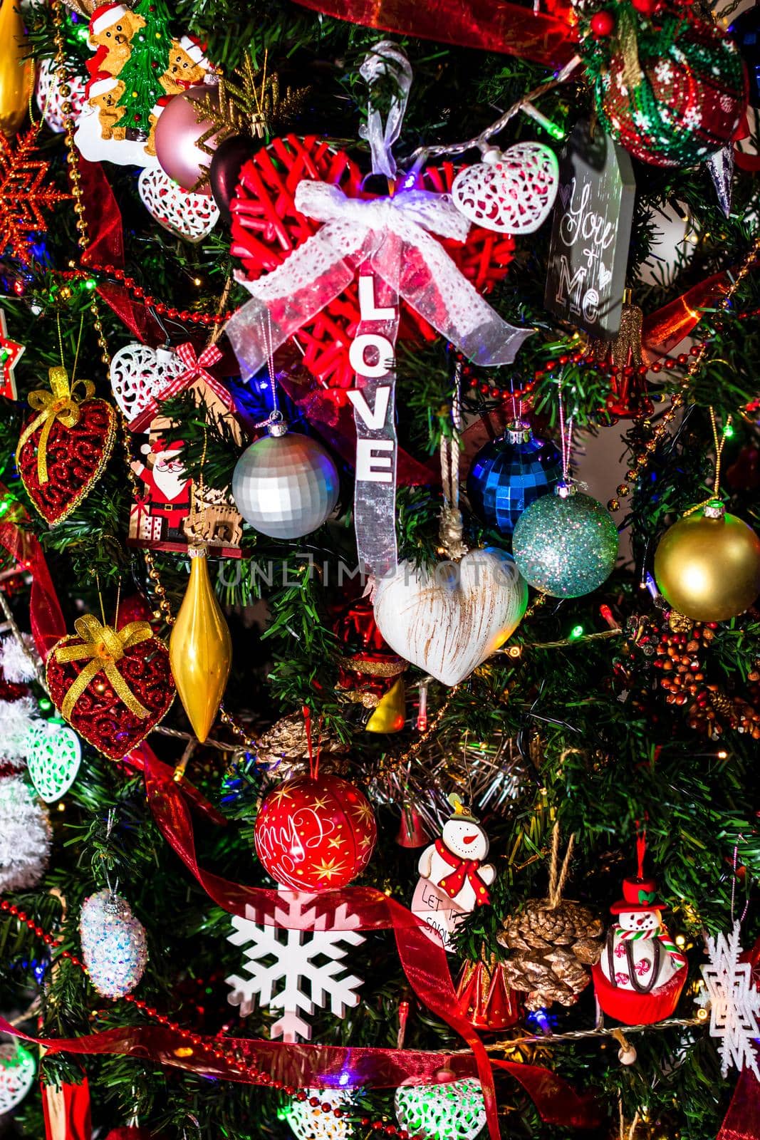 Beautiful Christmas ornaments and decorations hanging in the Christmas tree