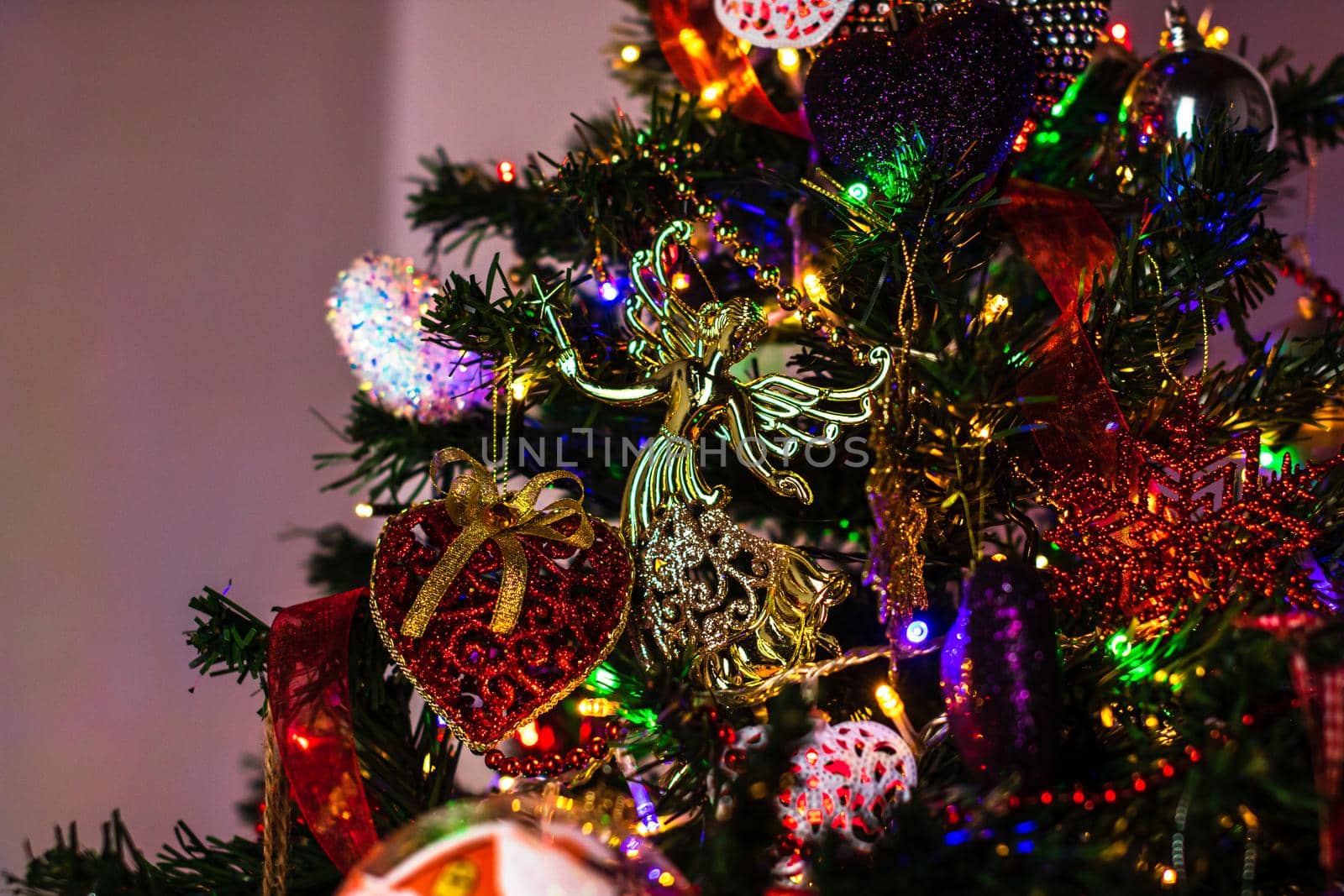 Beautiful Christmas ornaments and decorations hanging in the Christmas tree