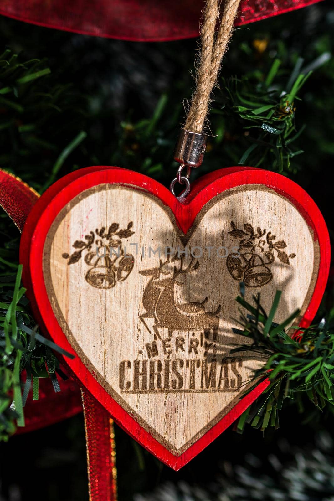 Heart Christmas ornament hanging in the Christmas tree