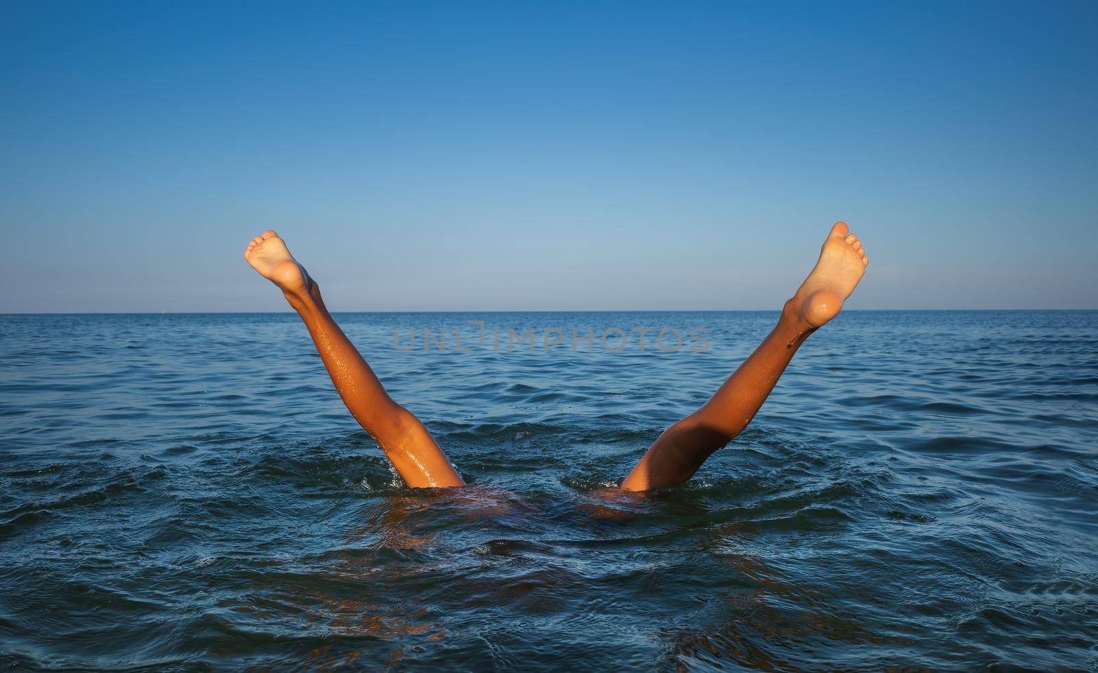  boy bathes in the sea by palinchak