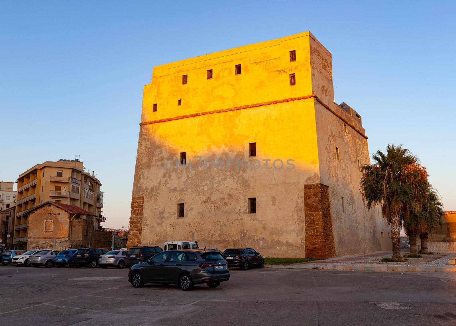 Porto Empedocle, Italy - July 22: View of the Fortress also called Tower of Charles V at sunset on July 22, 2021