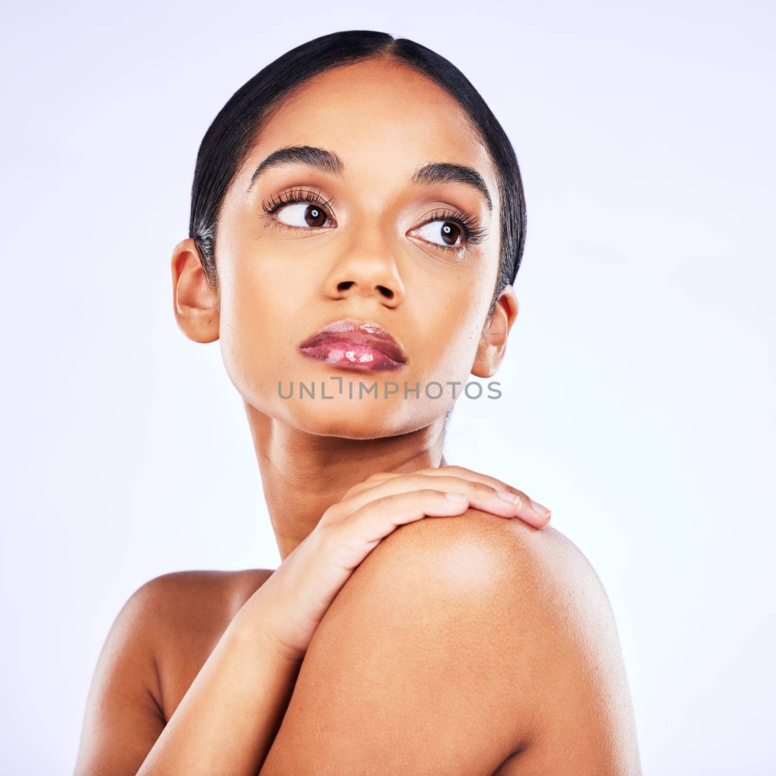 Thinking, shine and woman with skincare, cosmetics and dermatology against a white studio background. Female person, natural beauty and model with wellness, bare and ideas with aesthetic and health by YuriArcurs