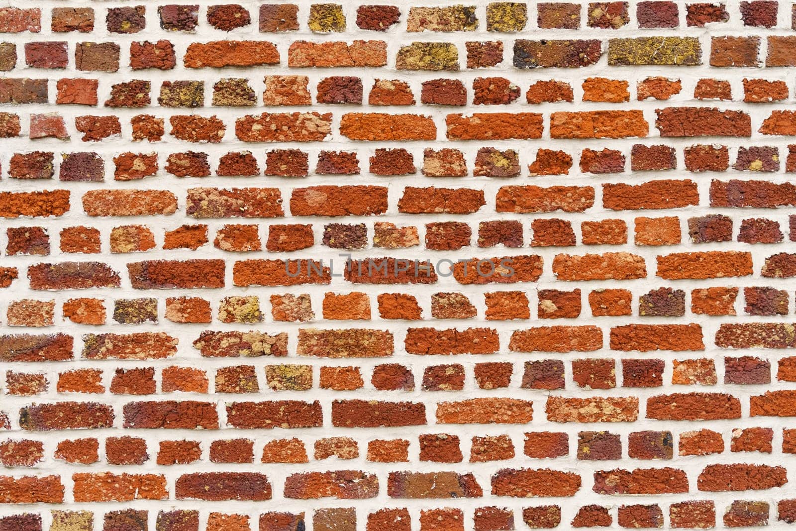Old red brick wall. Texture of a brick wall.