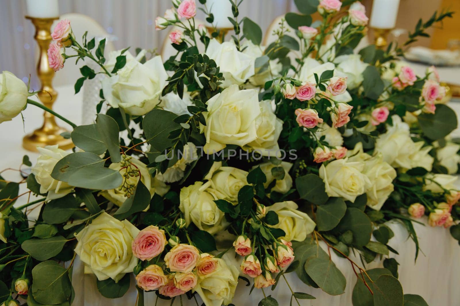 Beautiful tenderless bouquet on wedding table. Elegance wedding decor. by leonik