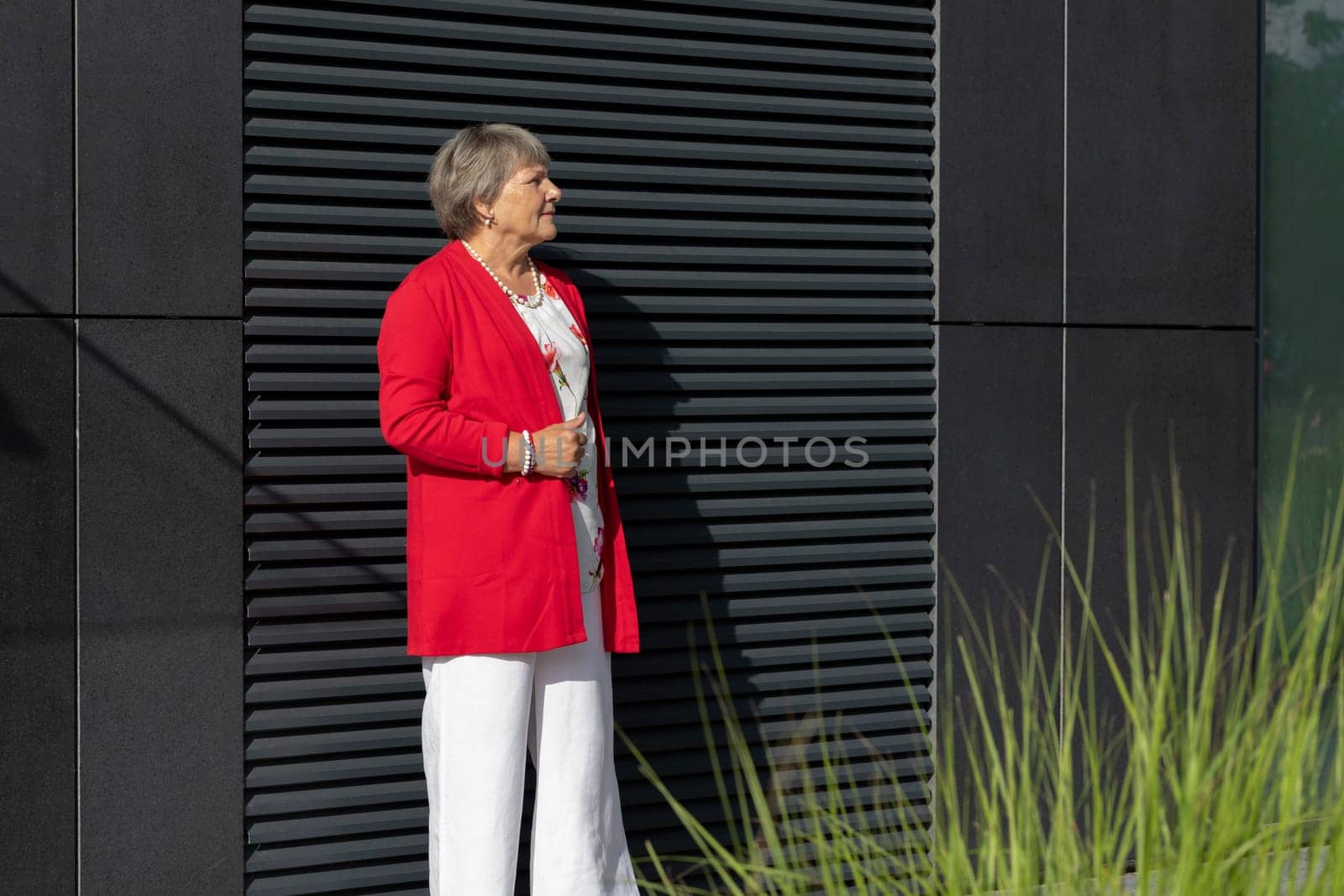 Portrait Real Beautiful Senior Old 70s Woman in City. Portrait Of Kind Calm Retired Mature Lady in Sunny Warm Day, Authentic Lifestyle, Pension Horizontal Plane. Copy Space For Text High quality photo