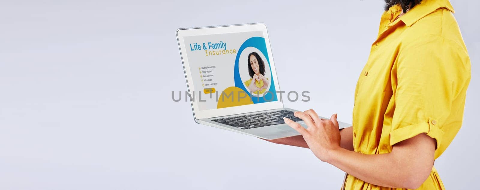 Laptop, insurance and security with a customer in studio on a gray background for life cover sign up. Computer, website and mockup with a female person searching for information about protection.