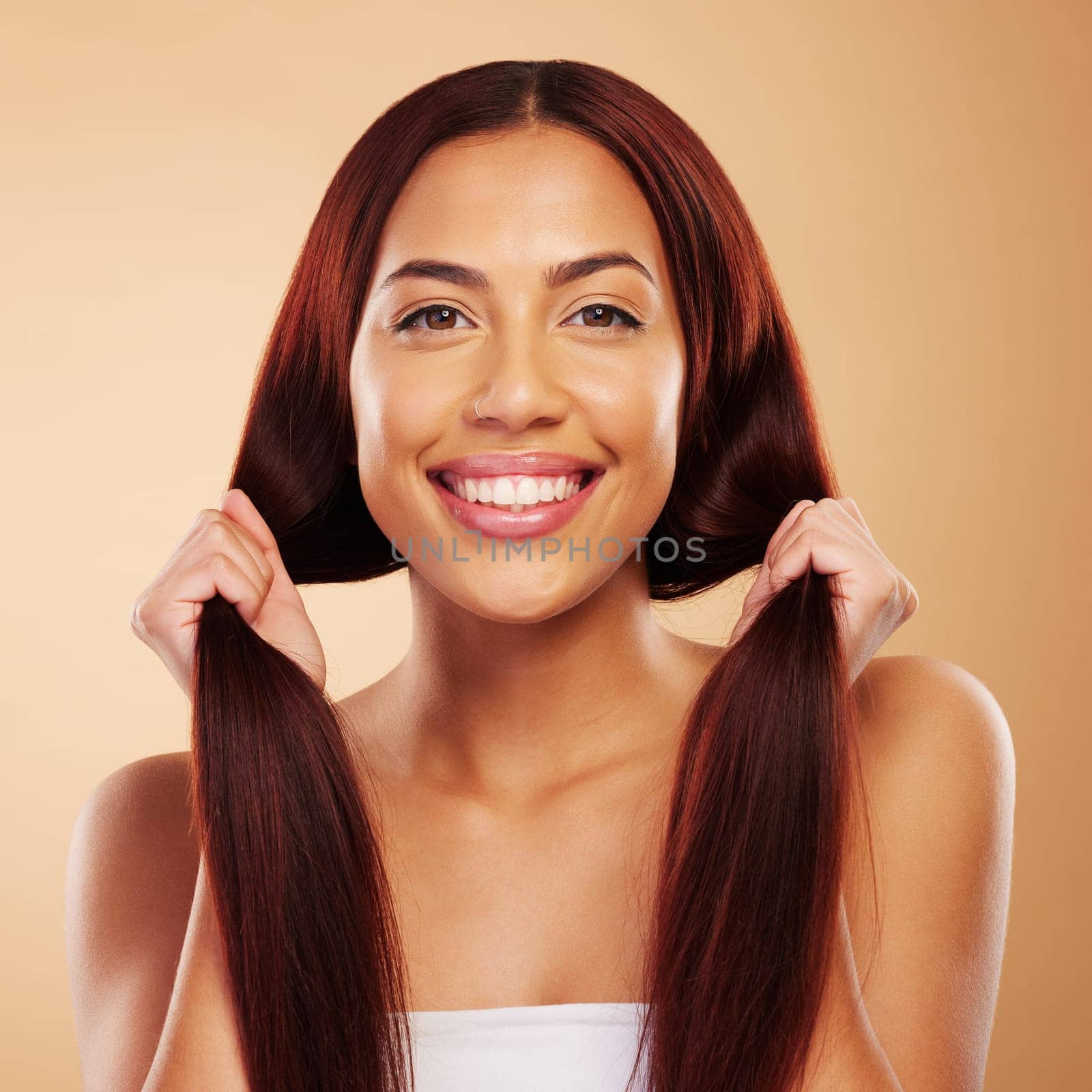 Haircare, beauty and portrait of happy woman with strong hair and luxury salon treatment on brown background. Smile, haircut and shine, face of model with natural cosmetics and makeup glow in studio