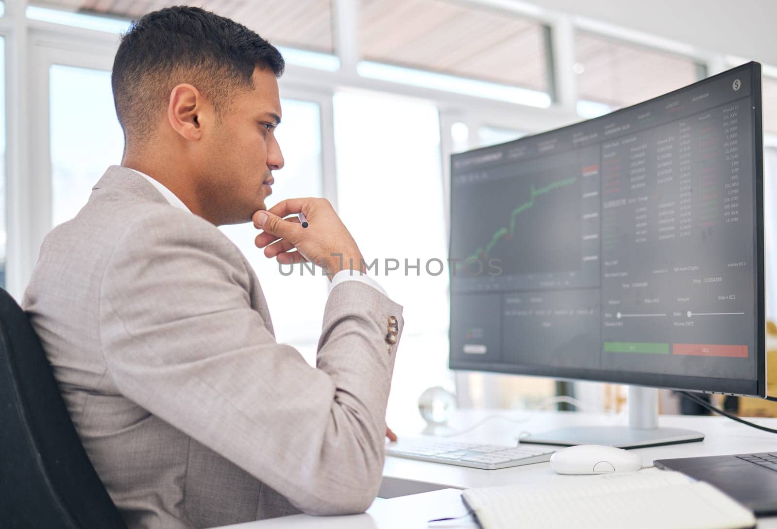 Businessman, thinking and stock market for financial investment, trading or cryptocurrency at office. Man, broker or trader monitoring finance, profit or increase on graph or chart on PC at workplace.