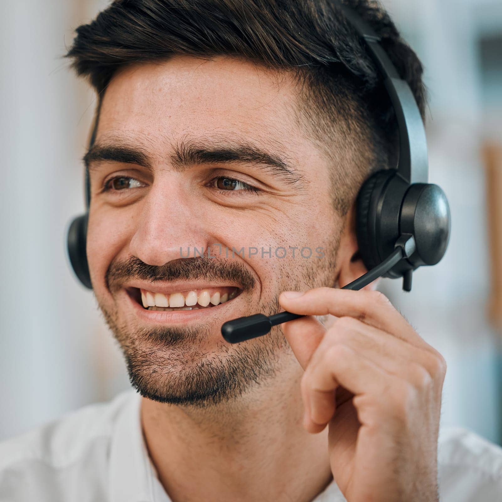Telemarketing, face and communication of man, agent or call center for customer service, lead generation or CRM. Happy salesman, consultant or microphone of telecom contact, advisory or FAQ questions.