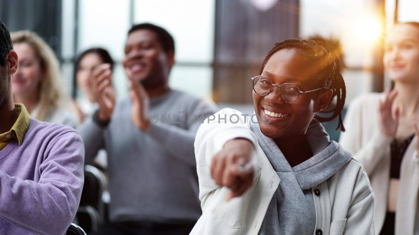 smiling african american woman pointing finger at camera. New career opportunities, recruitment and employment