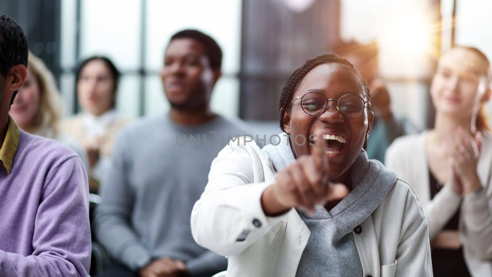 smiling african american woman pointing finger at camera. New career opportunities, recruitment and employment